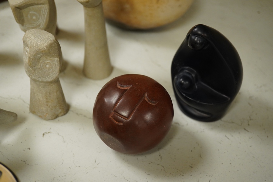 A quantity of African stone carvings together with a similar carved gourd vase, largest 28cm wide. Condition - fair/good